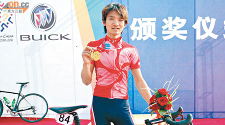 黃金寶在09年山東全運會創下三奪單車公路賽金牌壯舉。